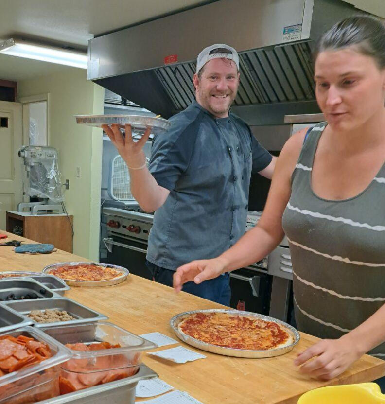 A banner reading Milton-Freewater Senior Center Tropical Bash; Saturday, April 26, 2025; 3:30 P.M. to 6:30 P.M.